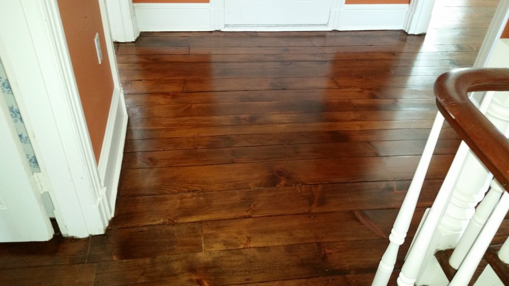 We used existing wood from another area of this historical Chester County home to match and patch this area of an upstairs hallway.