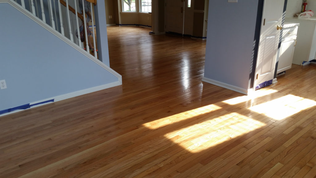 Who Refinishes Hardwood Floors? Here's Why Only Pros Should.